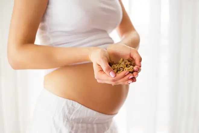 Eating nuts early in pregnancy can boost a baby's brain development, it has been claimed (stock image)