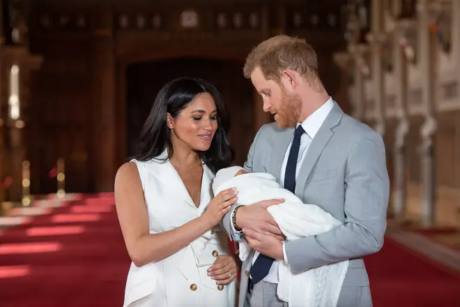 Meghan Markle checked on the little one as the photocall took place