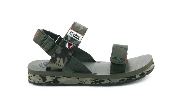 Palladium have some statement camp-print strappy sandals with red accents