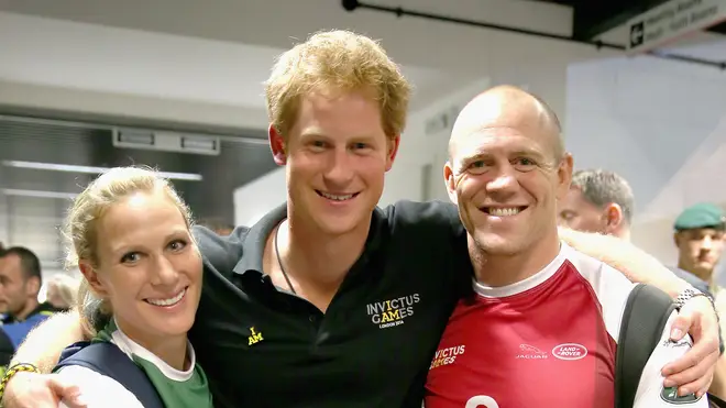 Mike Tindall with his wife, Zara Tindall, and Prince Harry at the Invictus Games in 2014