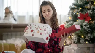 A lot of people with December birthdays receive birthday presents in festive paper