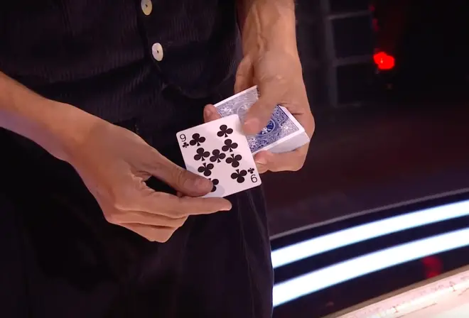 When Simon revealed his hand, the card was gone, which left the judges confused