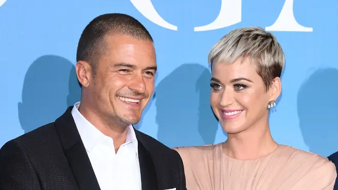Katy details Bloom's proposal which included a romantic meal, flowers and a helicopter ride where she was met by her friends and family upon landing