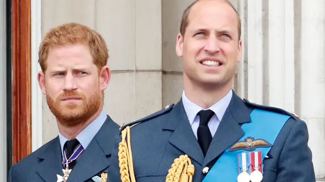 Prince Harry and Prince William watch a flypast to mark the centenary of the Royal Air Force from the balcony of Buckingham Palace in July 2018