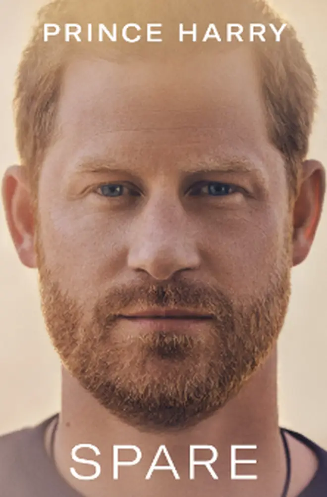 Prince Harry appears on the cover of his first book, Spare