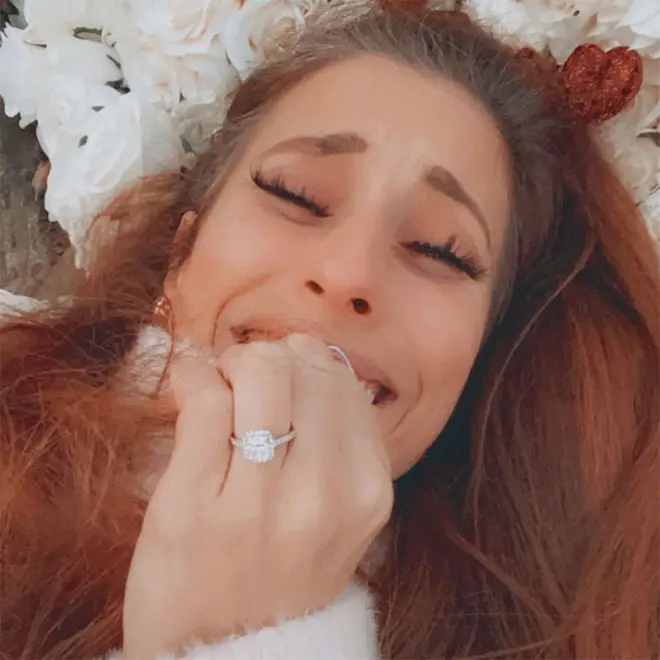 Stacey Solomon smiling and showing off engagement ring