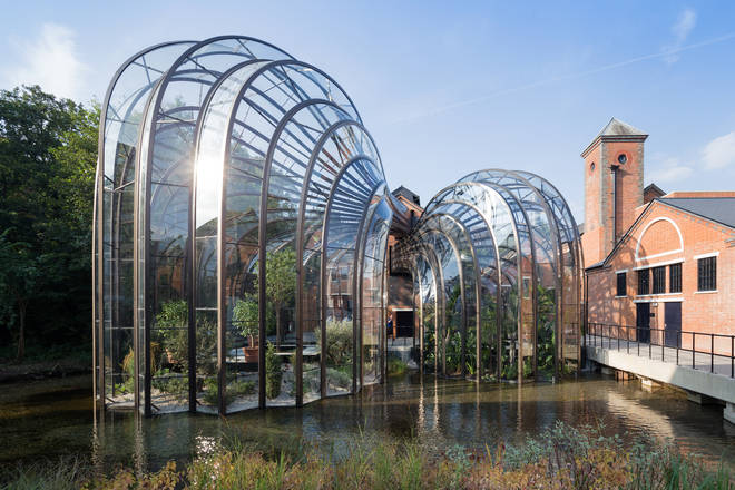 The glass houses were designed by Thomas Heatherwick, who also designed the London Olympics 2012 cauldron