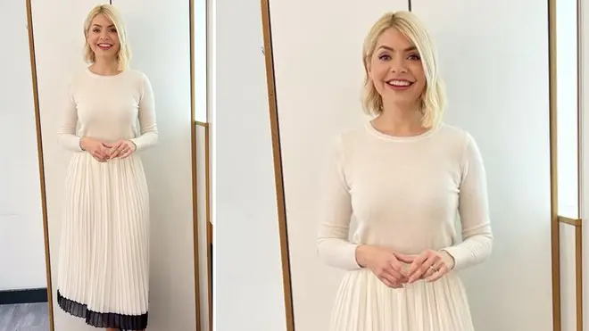 Holly Willoughby is wearing a midi skirt from Reiss