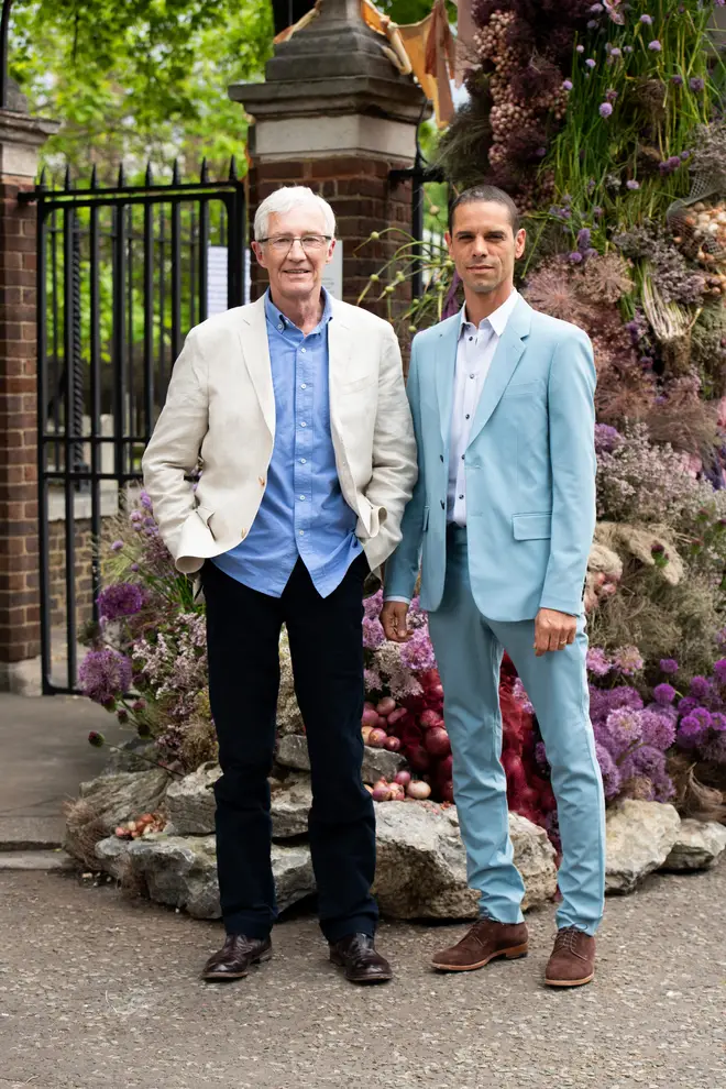Paul O'Grady and his husband Andre Portasio attend the Chelsea Flower Show, 2022