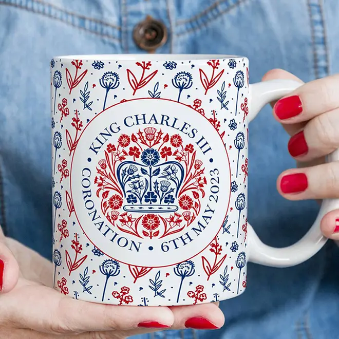 Coronation mug in red, white and blue featuring King Charles's emblem