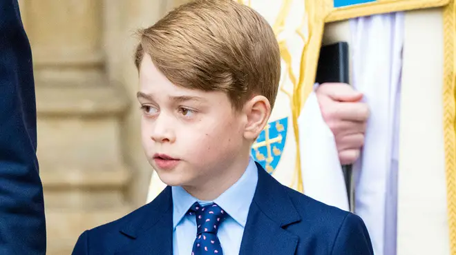 Prince George wearing a suit and tie