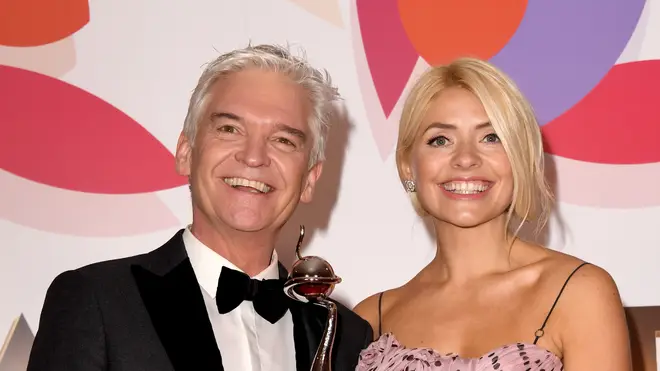 Holly and Phil pose for pictures at the National Television Awards