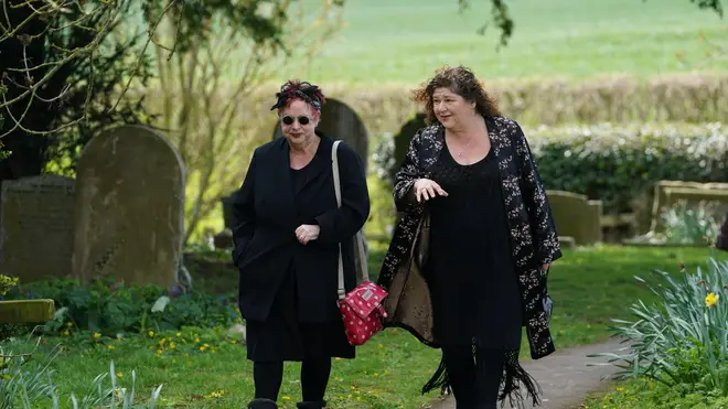 Jo Brand and actress Cheryl Fergison arrive at the church for the funeral of Paul O'Grady