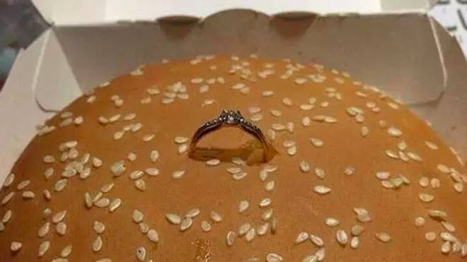 A man has used a Big Mac to propose to his girlfriend