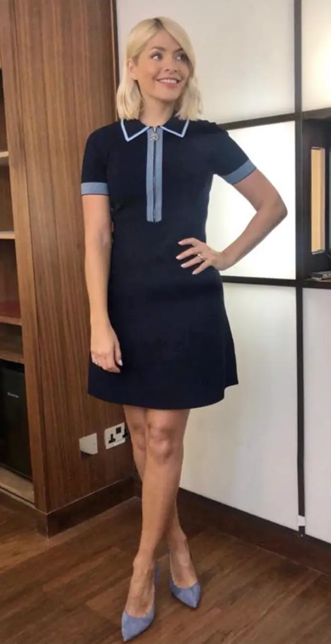 Holly wore a navy mini dress for Monday's show