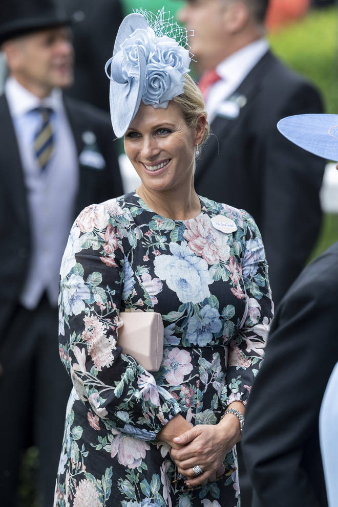 Zara Tindal opted for a floral dress, with a blue fascinator