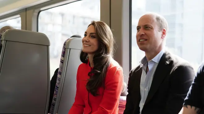 The Prince and Princess of Wales travel on London Underground's Elizabeth Line in central London