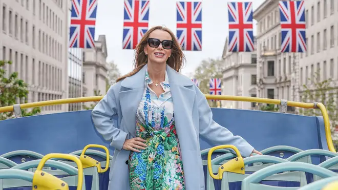 Amanda Holden arrives to the Heart studios in a double-decker Union flag wrapped London bus ahead of the coronation of King Charles III