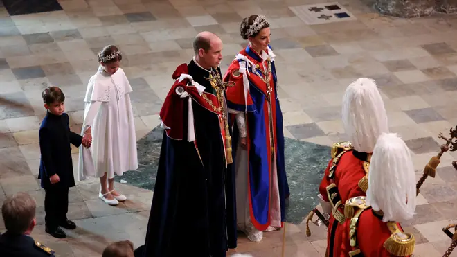 Prince Louis and Princess Charlotte with their parents at the King's coronation