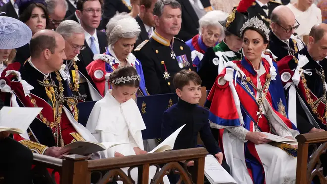 The Prince of Wales, Princess Charlotte, Prince Louis and the Princess of Wales at the coronation ceremony of King Charles III and Queen Camilla