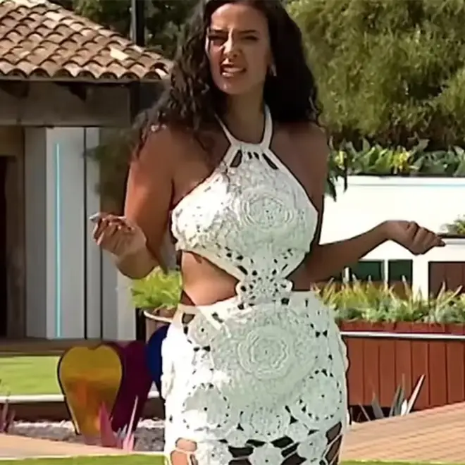 Maya Jama hosting Love Island in the Mallorca villa wearing a white crochet dress