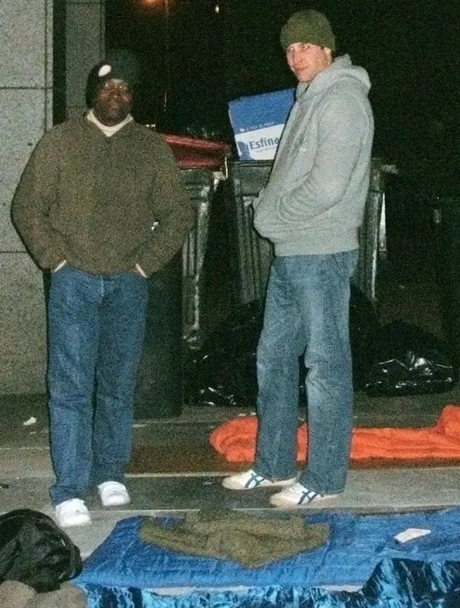 Prince William is pictured in 2009 with Centrepoint Chief Executive Seyi Obakin as they both spend a night on the streets of London
