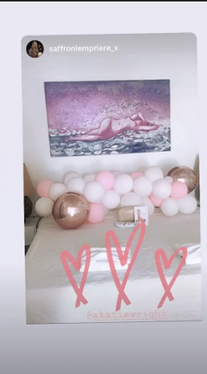 The master bedroom was decorated with pink and white balloons