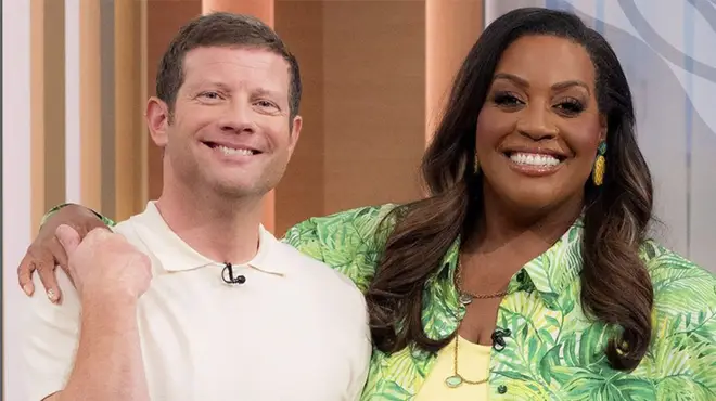 Alison Hammond and Dermot O'Leary smiling for a picture on the set of This Morning