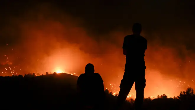 Wildfires have swept across the Greek islands of Rhodes and Corfu.