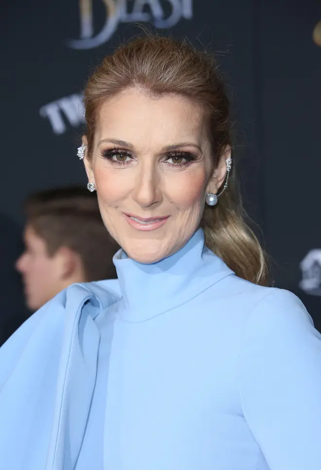 Celine Dion smiles into camera