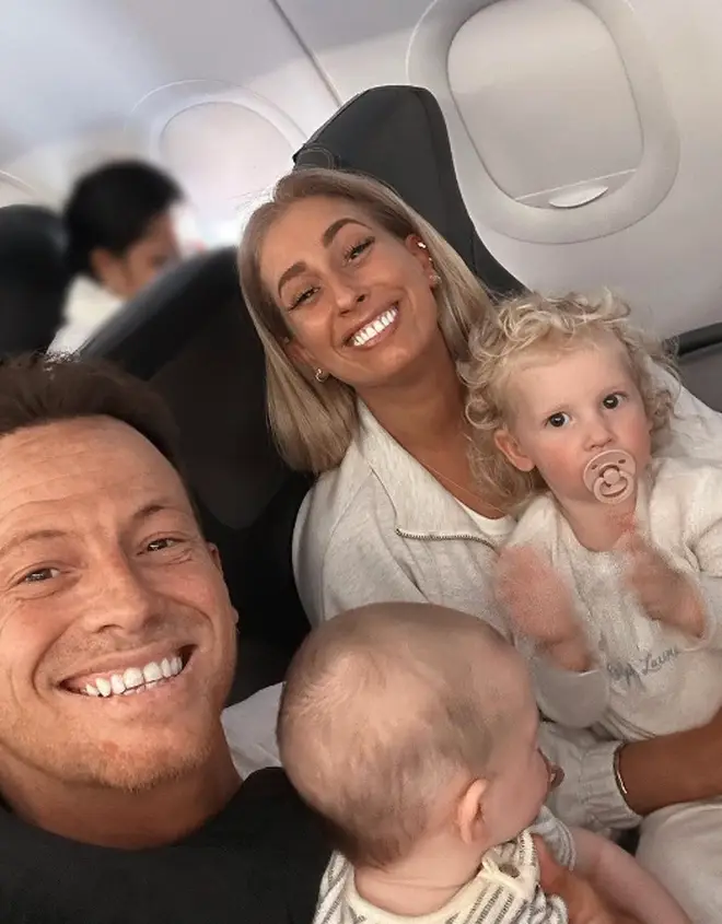 Stacey Solomon and Joe Swash are all smiles as they jet off on holiday with their kids