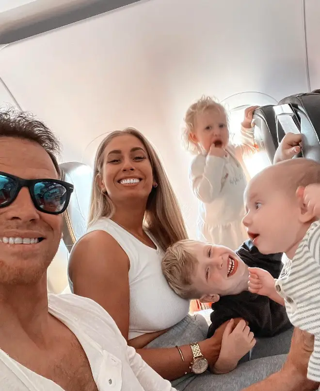 Stacey Solomon poses with husband Joe Swash and their three children Rex, Rose and Belle