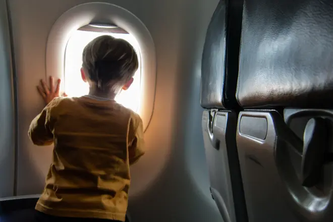 The mum went to her assigned seat and left her children [stock image]