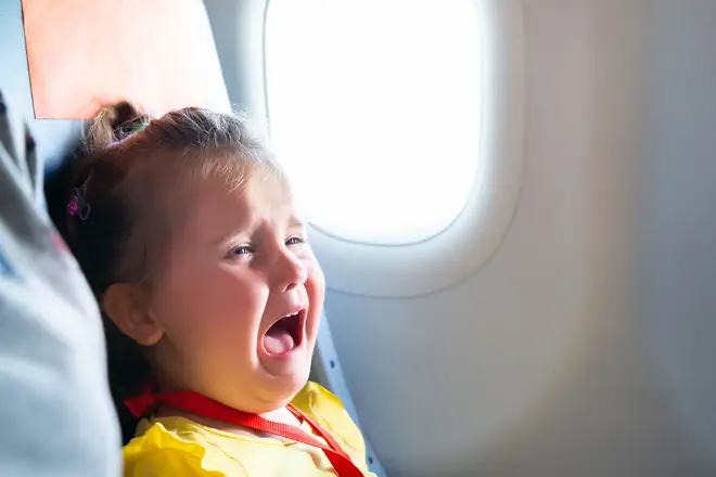 A mum left her children with a stranger on the plane [stock image]