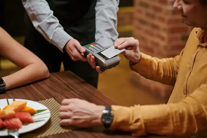 The woman said she wanted to split the dinner bill as he had paid for their lunch at a cafe on their first date [Stock Image]