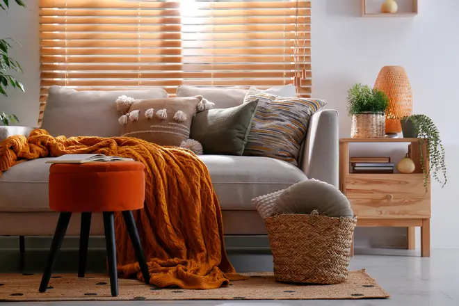 Switching out your cushions and throws for ones with more autumnal colours will transform your space