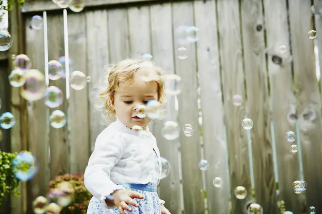 Using bubbles for sensory play can help your children learn about cause and effect