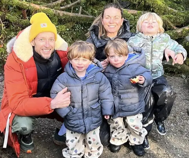 Jonnie Irwin smiles with his three sons and wife Jessica