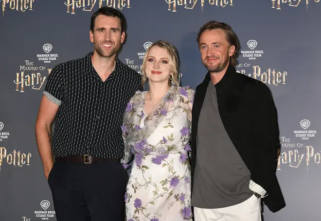 Evanna Lynch with fellow Harry Potter actors Tom Felton and Matthew Lewis