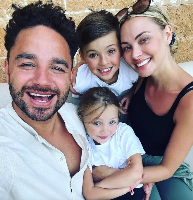 Adam Thomas poses with his wife, Caroline, and his two children Teddy and Elsie