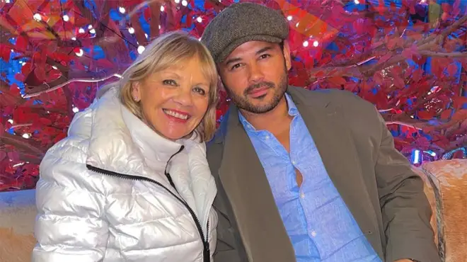 Ryan Thomas sitting next to mum gail