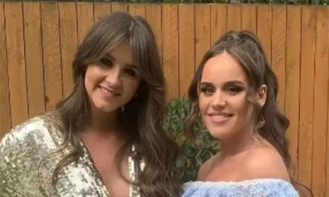 Brooke Vincent and Ellie Leach dressed in party dresses in a garden