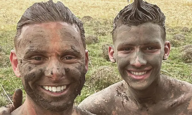 Jeff Brazier covered in mud with youngest son Freddie Brazier