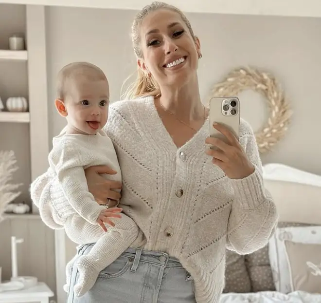 Stacey Solomon smiles with her daughter Belle
