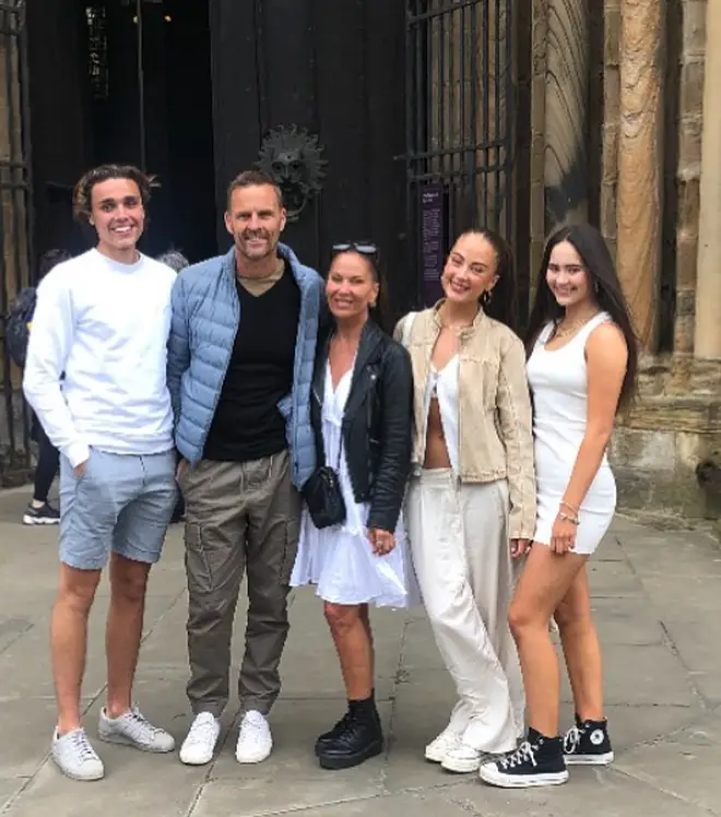 My Mum Your Dad couple Sharon and Elliott, with their kids Zach, Mimi and Tia, pose outside Durham Castle