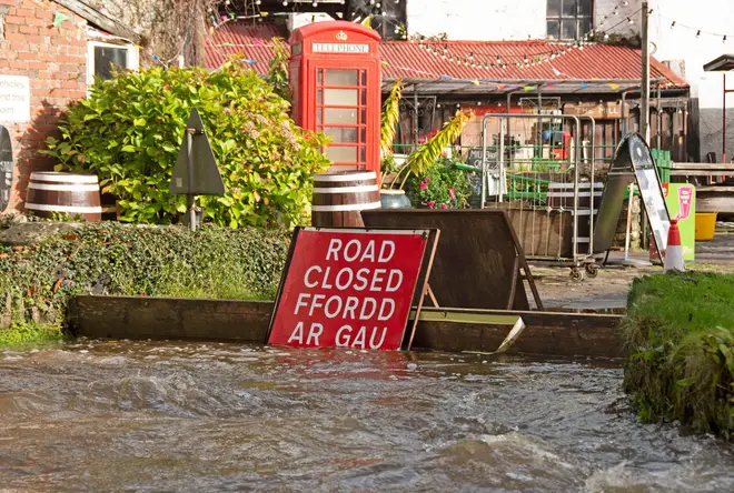 The road outside the Gower Heritage Centre, Swansea is blocked off due to flooding as Storm Ciarán moves across the UK