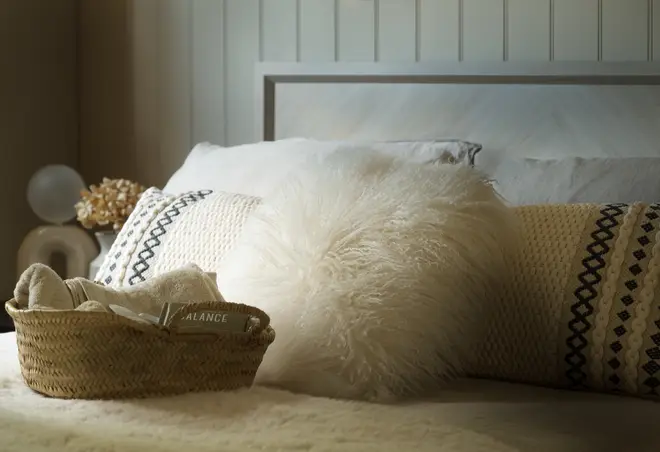 Cosy throws, cushions and bedding can help transform your home into a Christmas haven