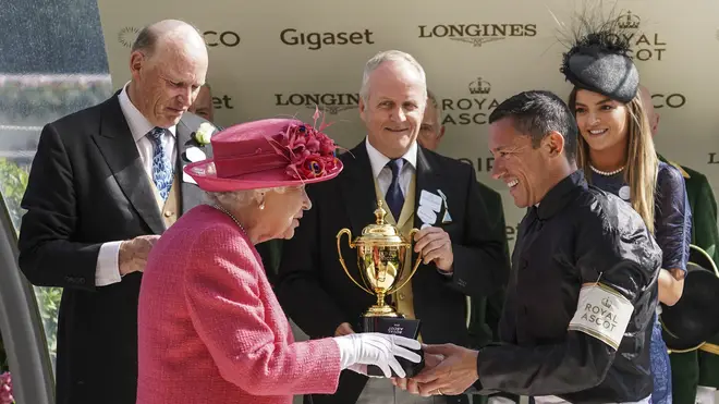 Frankie Dettori pictured with the late Queen Elizabeth II at Royal Ascot, 2018