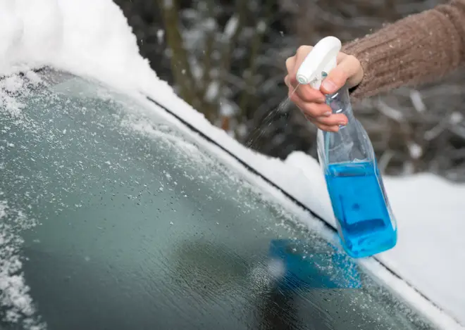 Mixing water and rubbing alcohol into a spray bottle can help you break down the frost on your car quicker