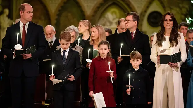 Kate Middleton, Prince William, Prince George, Princess Charlotte and Prince Louis holding candles at the service
